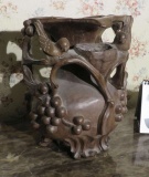 ornately carved wood vase 10