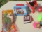 assorted collectible toys, troll dols, timeless silhouette Barbie doll
