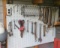 peg board of old wrenches , snips, adjustable wrench