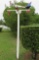 airplane weather vane in front yard