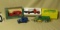 collection of 4 collector model trucks and bank