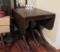 Duncan Phyfe style drop leaf table wit vintage casters (dining room)