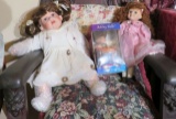 group of 3 dolls