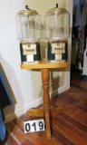 double head g gumball machine on oak stand with keys