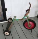 green vintage tricycle