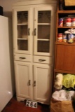 White wooden cabinet, 5 shelves, 2 drawers, top half has glass doors 26 inches wide and 69 inches ta