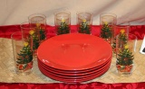 set of 8 Christmas Glasses, 6 red plates, red rectangle tablecloth and gold table runner