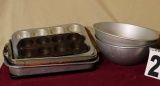 group of 8 metal baking pans and mixing bowls