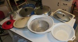 assorted lids, strainer, sifter