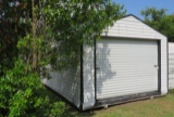 storage shed on skids with roll up door and side door 12' w x 20' long