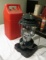 Coleman white gas lantern with carry case.  This lamp like new never had gas in it.
