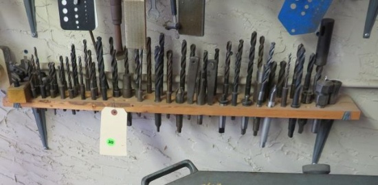 shelf of   60+ long drill bits,