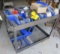 warehouse stock cart with mixed fasteners and assorted items'