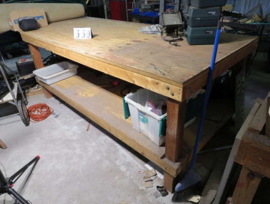 heavy duty wood work bench 4' x 10' 11" long  includes 35 " overhang  39" high with under shelf