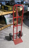 red hand truck with pneumatic I tires