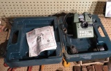 drill doctor in plastic case with used drill bits