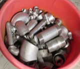tote of pipe fittings