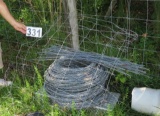 coil of used barbed wire (good condition) and wire fence spreaders