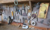 mixed tools on peg board
