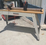 Ridgid wood lathe on stand handles up to 38