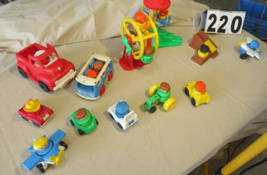 mixed cars and carnival rides with little people - lading machine, Ferris wheel, swing ride, bus, tr