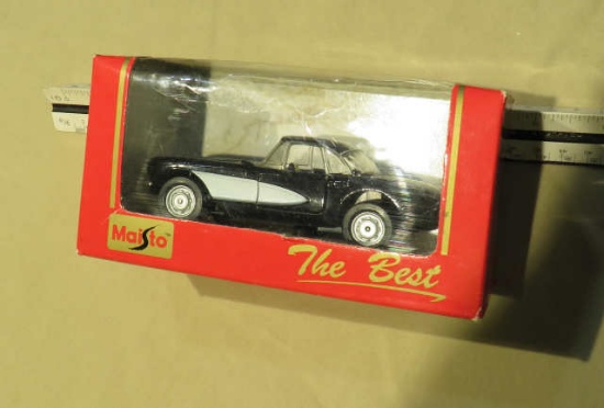 Maisto Trophy 1957 black and white Corvette 1/32 scale die cast metal car in original packaging