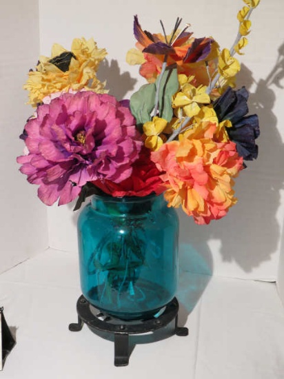 blue art glass vase with silk floral arrangement in wrought iron stand 8"dia x 13" h (24" overall he