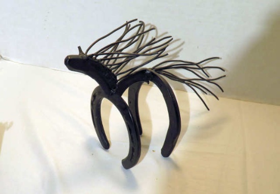 Western art made from horseshoes shaped like a horse, 8"h