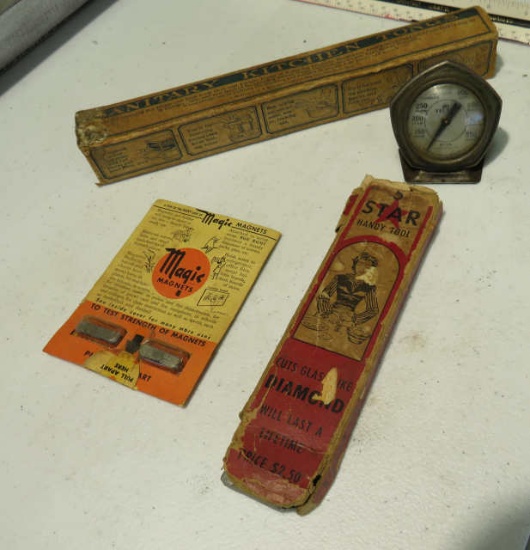 tongs, oven thermometer, glass cutter in original box, magic magnet in original package