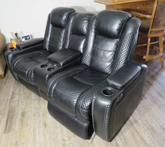 black faux leather remote control twin seat sofa with center armrest storage compartment, and USB ja