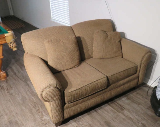 60" beige fabric upholstered love seat matches 682 (has absorbed cigarette smoke smell)