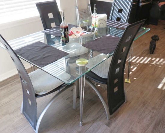 glass top dining table with 6 chairs 60" L x 40" w x 29" h