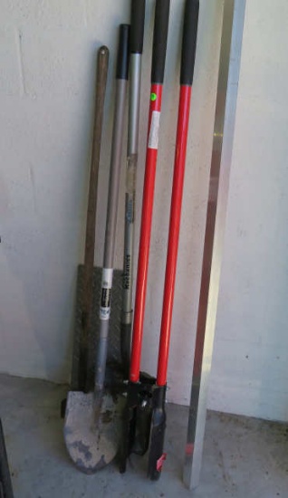 group of 3 yard tools including post hole digger and 2 shovels and a scraper