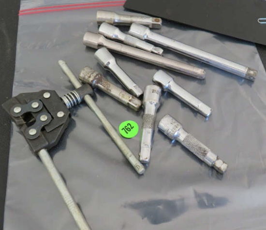 mixed 2/8" drive extensions and bicycle chain breaker