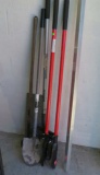 group of 3 yard tools including post hole digger and 2 shovels and a scraper