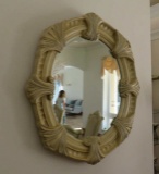 framed oval mirror 46