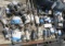 assorted used outboard motor starters, trim pumps, trim motors