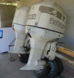 1998 Evinrude 200 hp outboards Model E200TXECM Note: gear cases are off for service.  It is reported
