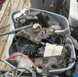 tote of mixed used outboard motor parts