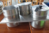 stainless insert with 3 stainless steel sauce to urines and two lids