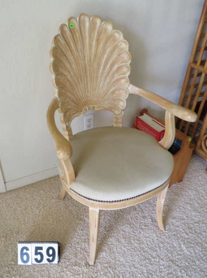blond finished wood arm chair with shell design back