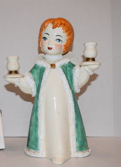 Porcelain angle has red hair with a blue robe holding two candles  Large Angel 12" X 8"