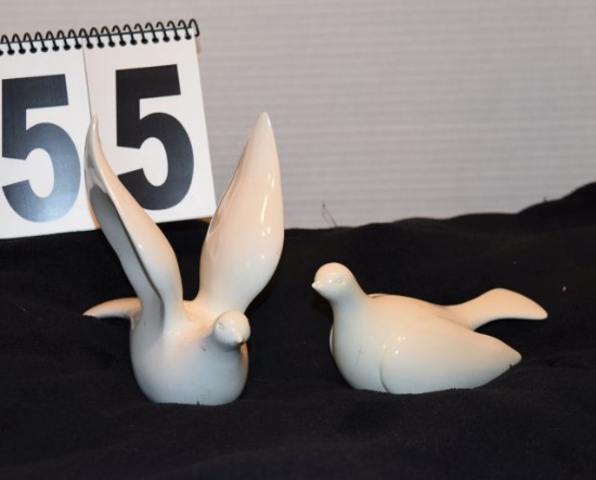 White porcelain doves 6" X 3", 3" X 3" 1 with wings spread other laying down