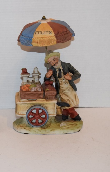 Old Man With fruit Cart 6 ½" ceramic cart with colorful umbrella over the small cart with assorted f