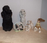Assortment Of Ceramic Dogs one large black poodle one tall white dog