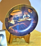 Knowles Norman Rockwell plate #10117L “Fathers Help” with mother sitting and knitting under a lamp w