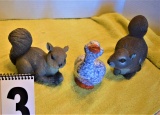 2 ceramic squirrels brown, 1 ceramic duck white with blue spots