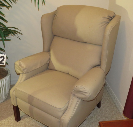 Wing back beige recliner arm chair (light stain on one arm)