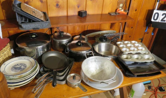 Mixed cookware, pots, pans, cookie sheets, muffin tins