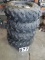 Four wheeler4 lug tire and rim assembly AT 25 x 8 - 12